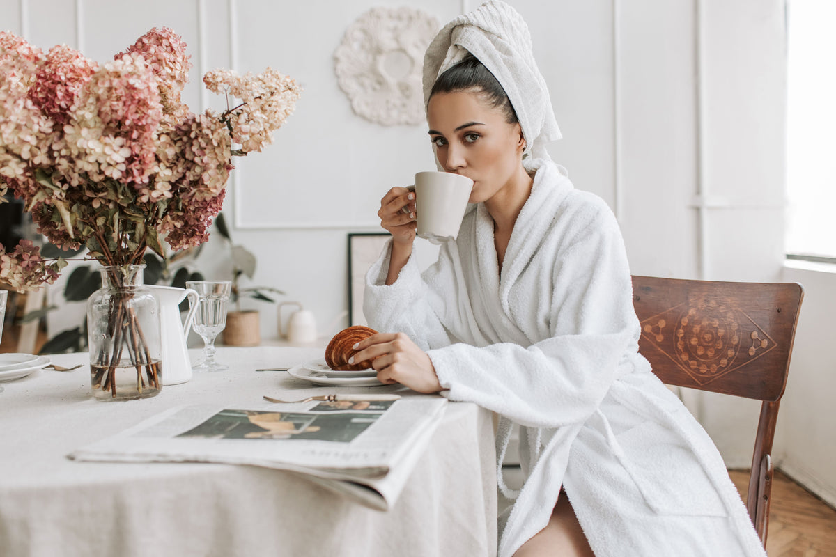 “Mom enjoying a quiet morning with coffee before starting her day.”